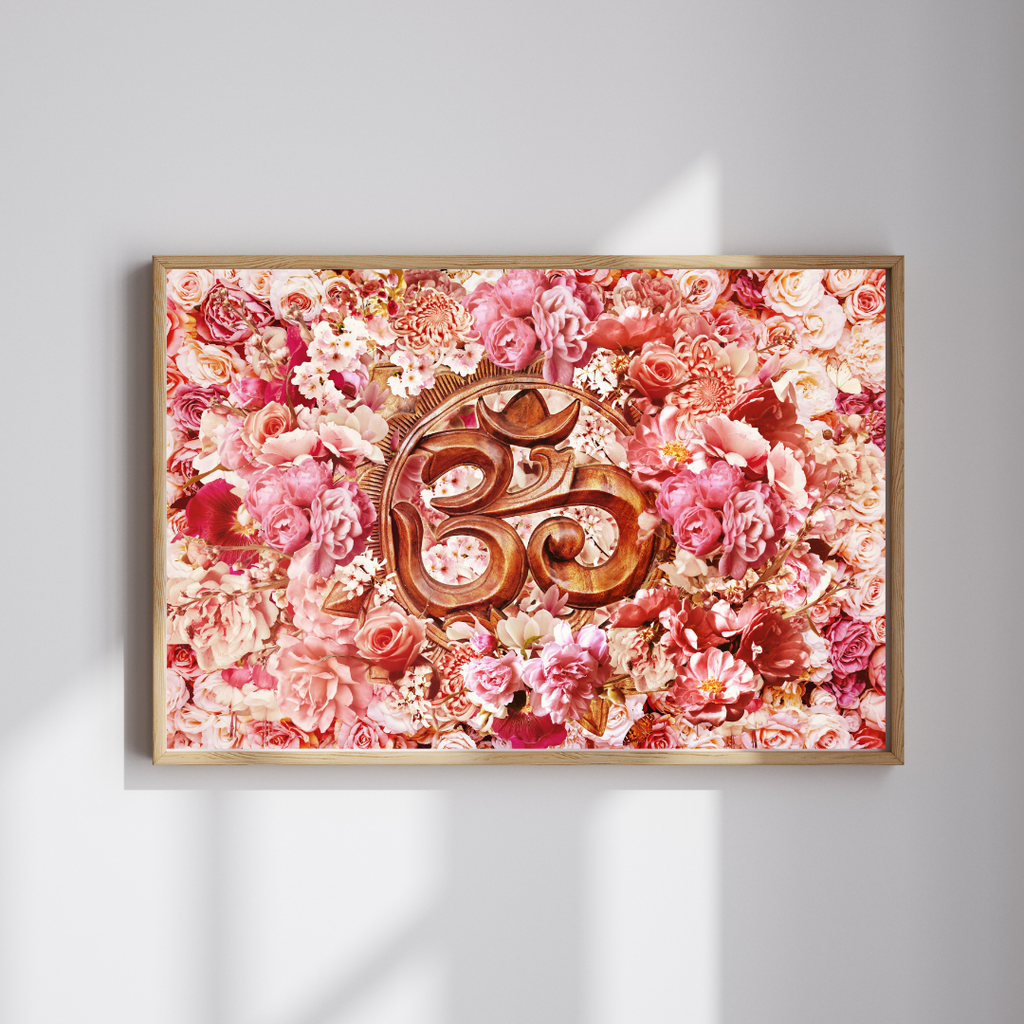 Decorative wall art with a floral background and central Om symbol on a light gray wall.