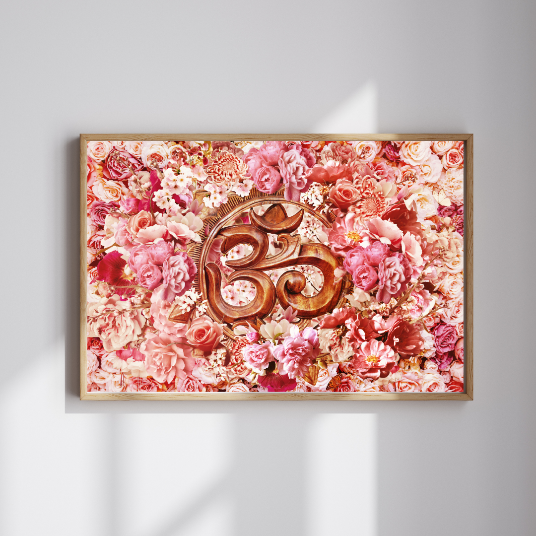 Decorative wall art with a floral background and central Om symbol on a light gray wall.