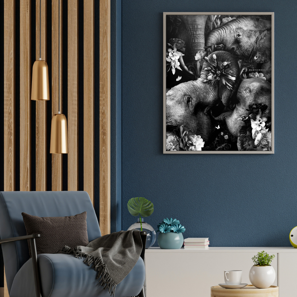 Modern living room with a blue armchair, framed black and white elephant artwork on the wall, and decorative elements.