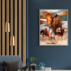 Living room with a blue armchair, gold pendant lights, and a framed artwork of horses on a blue wall.