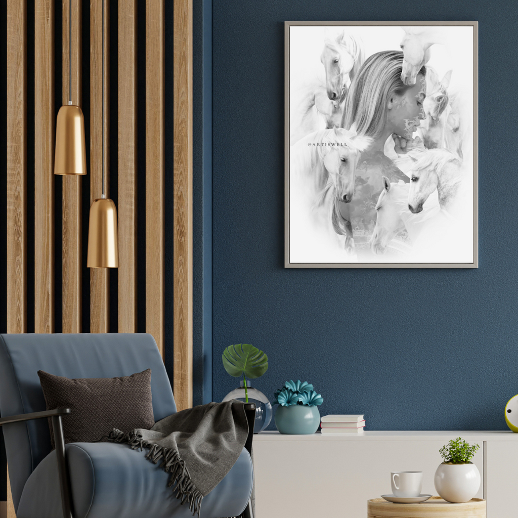 Modern living room with a blue armchair, gold pendant lights, and a framed artwork on the wall.