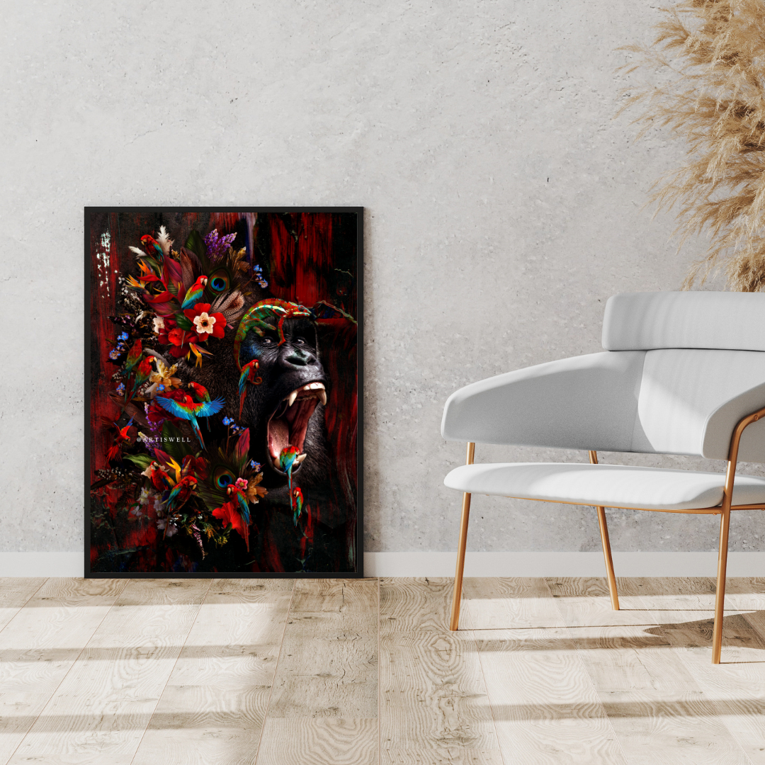 Abstract painting of gorilla and parrots by dekozi on a wall next to a modern white chair with gold legs.