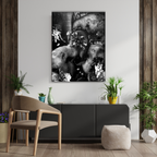 Living room with a large black and white elephant painting on the wall, a chair, and decorative plants.
