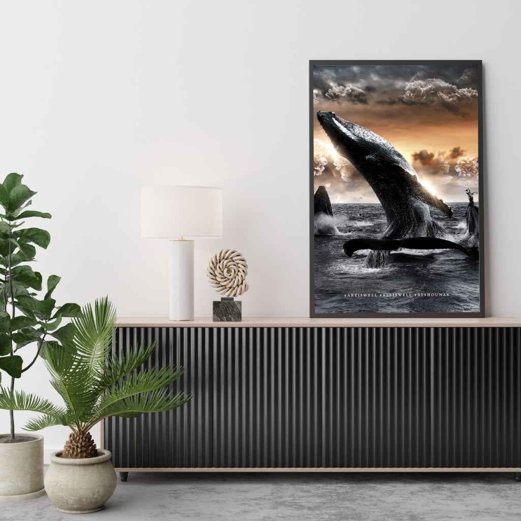 Framed whale artwork on a wall above a console table with decorative items by dekozi.